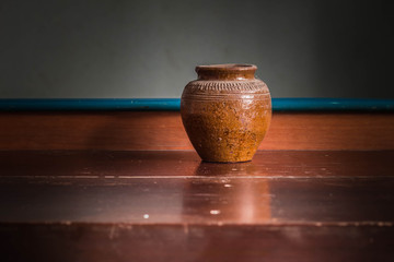 Old jar in the darkness.