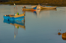 Three Wooden Fishing Boats In Morocco.