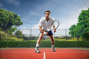 Young man is playing tennis