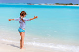 Fototapeta Morze - Little girl on vacation