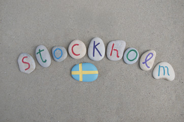 Wall Mural - Stockholm, souvenir on carved stone letters with swedish flag