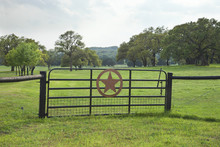 Ranch Gate With Pasture And Trees In The Texas Hill Country