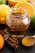 honey with citrus fruit and cinnamon