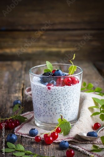 Obraz na plátně Natural yogurt with chia seeds and fresh berries