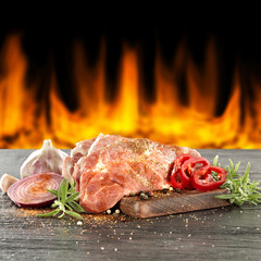 fire and raw meat 