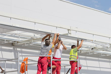 Workers Installing Awnings