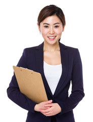 Wall Mural - Young businesswoman hold with clipboard