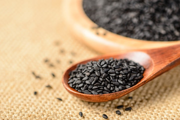 Poster - black sesame in the wooden spoon, (large depth of field, taken with tilt shift lens)