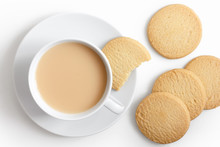 White Cup Of Tea And Saucer With Shortbread Biscuits From Above.