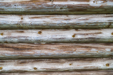 The background with the texture of logs 