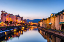Otaru Canal Was A Central Part Of The City's Busy Port In The First Half Of The 20th Century.Now ,the Warehouses Were Transformed Into Museums, Shops And Restaurants.