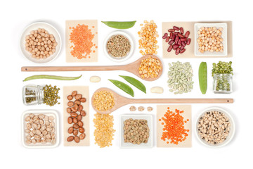 Wall Mural - various legumes on white background top view