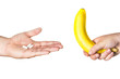 pills and big banana in man's hands