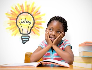 Canvas Print - Composite image of pupil sitting at her desk 