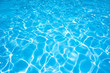 © peangdao - Blue water rippled background in swimming pool