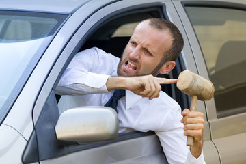 Stressed and angry driver in his car