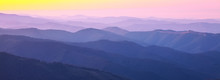 Mountain Peaks At Sunset Haze