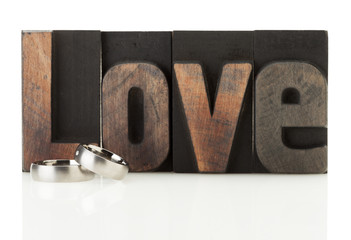 Wall Mural - wedding rings and the word love