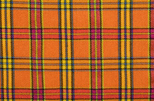 Scottish Tartan Pattern. Orange And Yellow Plaid Print As Background. Symmetric Square Pattern.