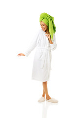 Poster - Woman standing in bathrobe