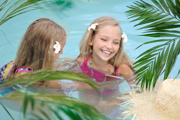 Sticker - Portrait of two girls in a swimming pool