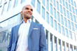 © zinkevych - Pleasant businessman standing near office