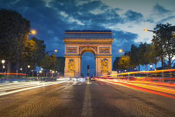 Arc de Triomphe. Image of the iconic Arc de Triomphe in Paris city during twilight blue hour.