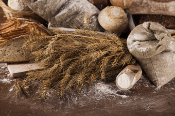 Wall Mural - Freshly baked bread on the wooden