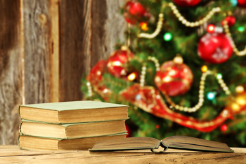 Wall Mural - xmas tree and wooden wall with books 