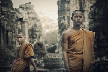 Wall Mural - Contemplating Monk Cambodia Angkor Wat Siam Reap Concept