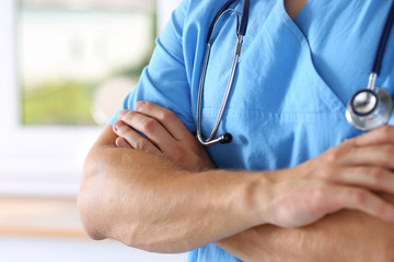 Canvas Print - Physician wearing blue uniform