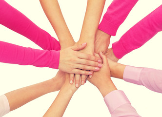 Wall Mural - close up of women with hands on top