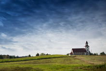 Countryside Panorama With Picturesque Village Church By The Corn Field. Sedki, Poland.