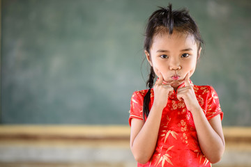 Little girl on red chinese dress