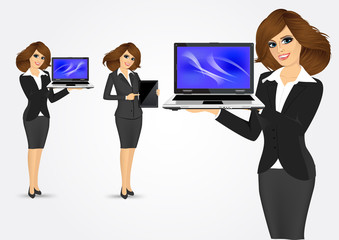 Wall Mural - businesswoman holding laptop and tablet