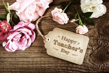 Wall Mural - Happy Teachers Day message card with small roses