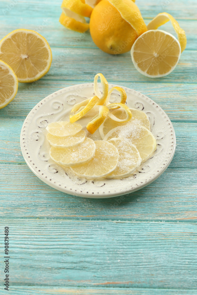Ripe lemons on wooden table close up