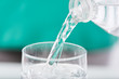 © thodonal - Pouring water into a glass