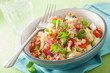 healthy quinoa salad with tomato cucumber onion chives