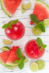 Wall Mural - Watermelon lime cooler - refreshing summer watermelon drink with lime and mint. Top view