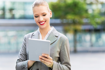 Businesswoman using digital tablet