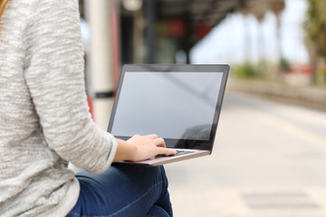 Poster - Entrepreneur working with a laptop in a train station