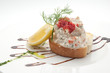 Sandwich with tuna salad and red caviar isolated on white