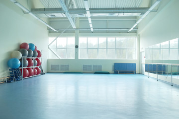 Wall Mural - Interior of a fitness hall with sport equipment