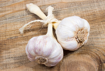 Wall Mural - Fresh garlic on board closeup.