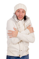 Wall Mural - Young man in winter clothes isolated on white