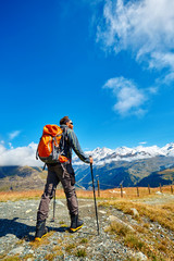 Wall Mural - hiker in the mountains