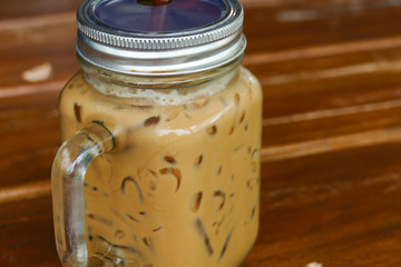 Wall Mural - iced cappuccino coffee in glass jug