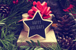 star-shaped chalkboard with the text happy holidays
