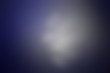 © sakchaiphoto - Abstract background blue dark and white-blur
